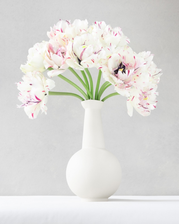 Marble tulips in a white vase